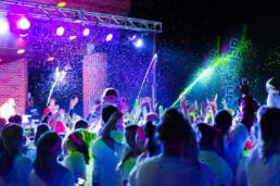 Event photograph of Neon Color Run crowd partying at night