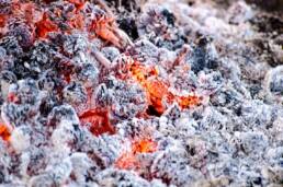 Still life photograph of ash with hot embers
